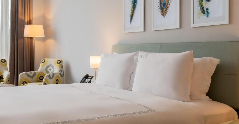 Crystal Inn Hotel - Alamein (Adults Only) El Alamein Esterno foto A bed with two pillows
